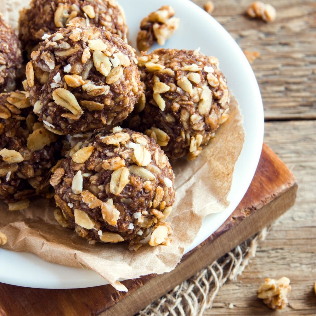 Round energy bites consisting of oats, chocolate, honey, and other ingredients.
